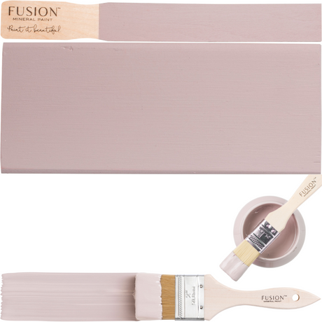 Rose Water by Fusion Mineral Paint, a neutral pink, displayed on wood with brushes and open paint can.