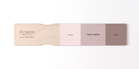 Paint swatch paddle showing Fusion Mineral Paint shades: Rose Water, peony, and damask.