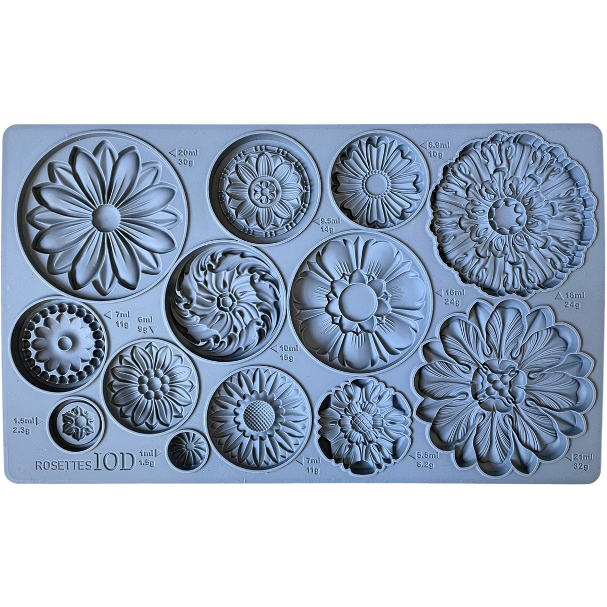 I.O.D. Rosettes Mould by Iron Orchid Designs with 12 distinct floral designs, each labeled with volume and weight.