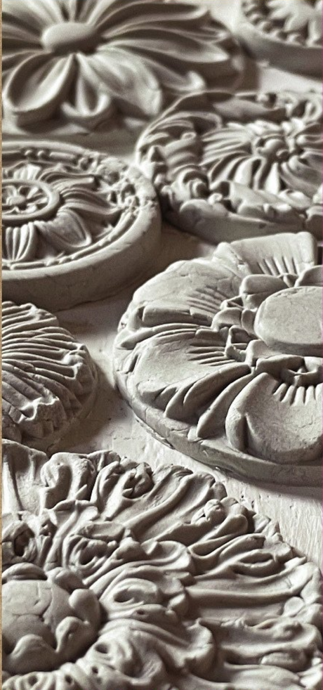 I.O.D. Rosettes Mould plaster medallions featuring detailed floral patterns by Iron Orchid Designs.