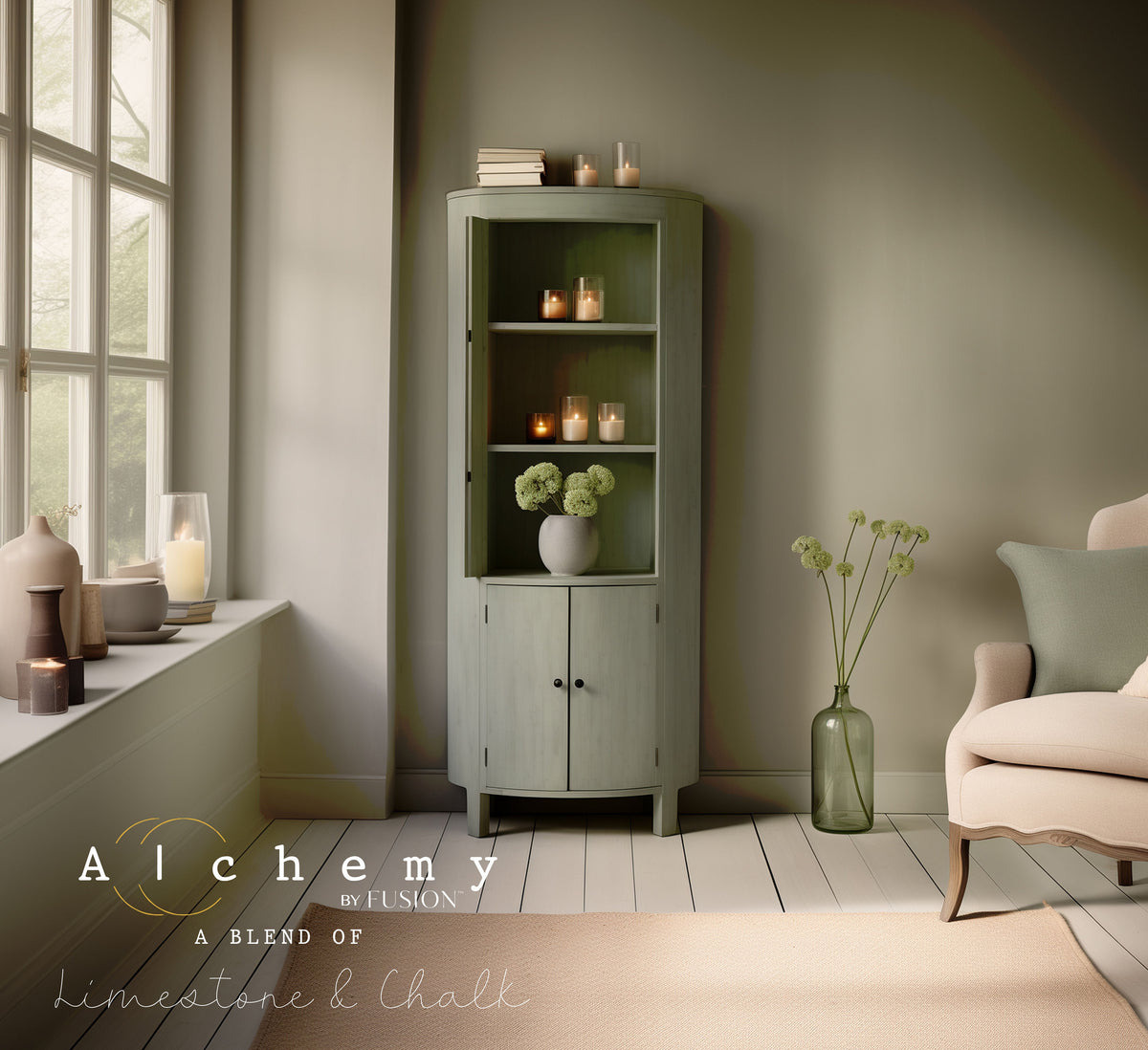 Corner cabinet in Sage Alchemy by Fusion Mineral Paint, accented with candles, decor, and flowers.