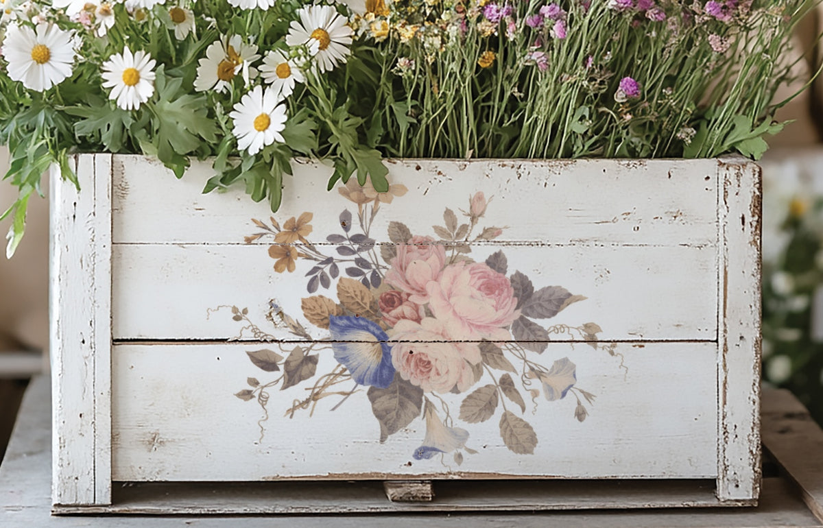 White wooden box with I.O.D. Saint Ouen Transfer, displaying daisies and wildflowers.