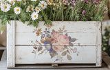 White wooden box with I.O.D. Saint Ouen Transfer, displaying daisies and wildflowers.