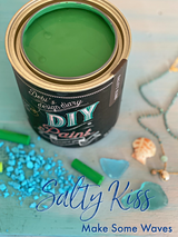 Salty Kiss DIY Paint by DIY Paint Co., can open, product label visible, with beach décor accents on blue background.