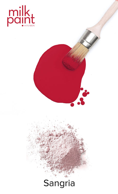 Fusion Mineral Paint Sangria Milk Paint brush with red powder and “Sangria” text on a white background.