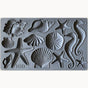 I.O.D. Sea Shells Mould with starfish, seahorses, sand dollars, and shells arranged in rows.