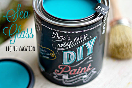 Open Seaglass DIY Paint can by DIY Paint Co., clay and chalk based, with brush and lid nearby.