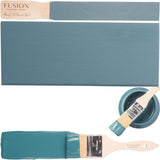 Seaside Fusion Mineral Paint brushed on wood, with paint lid and brush showing all-in-one formula.