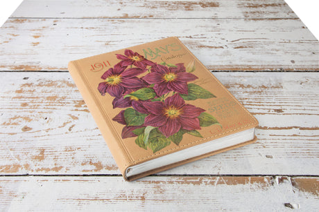 I.O.D. Seed Catalogue Transfer featuring classic purple flower designs for DIY décor projects.