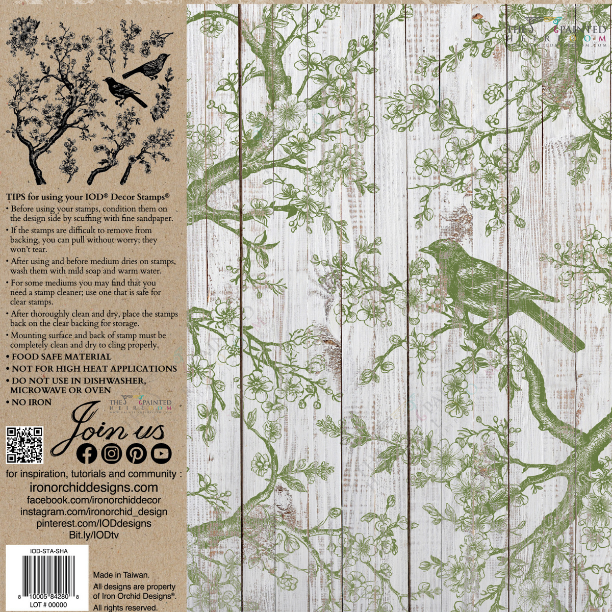 Green bird and branches stamped with I.O.D. Shade & Song Stamp on a whitewashed wood background.