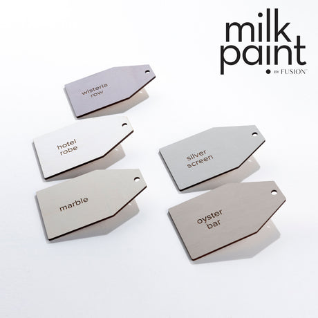 Five rectangular tags showing hues: natural milk paint, hotel robe, Silver Screen by Fusion, marble, and oyster bar.