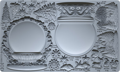 IOD Snow Globes Mould (2025) by I.O.D. with tree, animal, and star designs; labeled in ml and grams.
