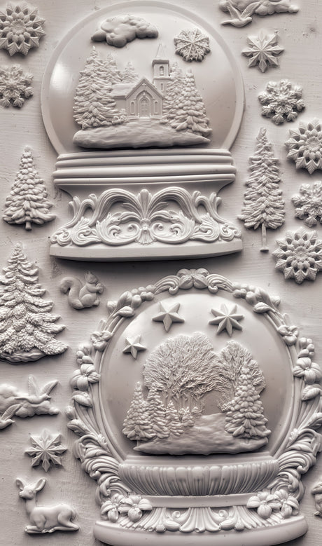 White ceramics featuring winter scenes made with IOD Snow Globes Mould, 2025 Limited Release.