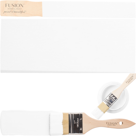 Two wooden brushes, white paint sample, and open Fusion Mineral Paint in Snowdrop.