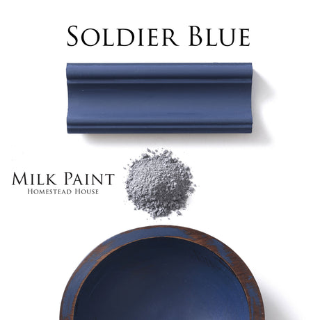 Soldier Blue Milk Paint by Homestead House with dark blue trim, gray powder, and a blue bowl shown.