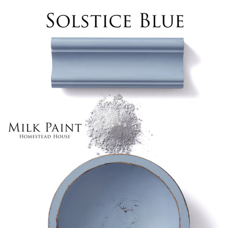 Blue molding, blue powder, and a bowl on white background. Text: Solstice Blue Milk Paint by Homestead House.