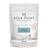 330g Solstice Blue Milk Paint by Homestead House in a bag with floral and wagon-themed art.