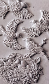 Four bird sculptures and a nest with eggs made using I.O.D. Sparrow’s Nest Mould and Air Dry Clay by Iron Orchid Designs.