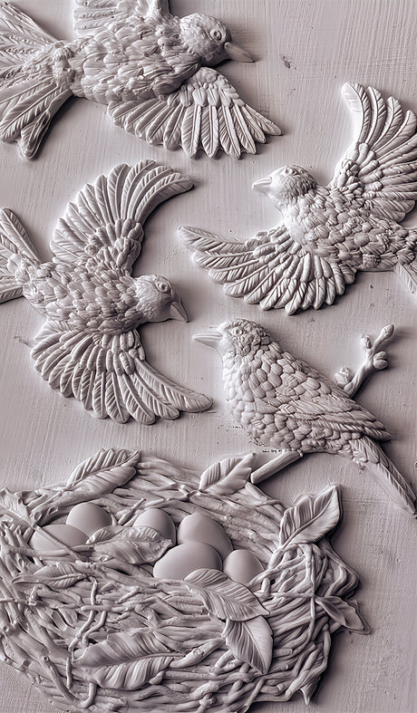 Four bird sculptures and a nest with eggs made using I.O.D. Sparrow’s Nest Mould and Air Dry Clay by Iron Orchid Designs.