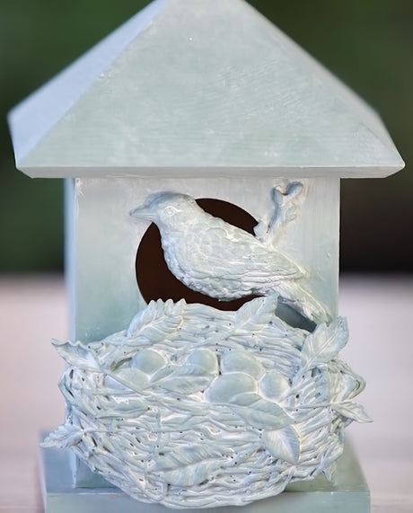 Pale blue birdhouse decorated with I.O.D. Sparrow’s Nest Mould birds, nest, and eggs.