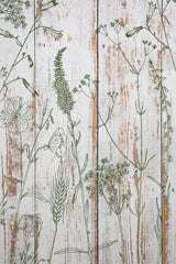 I.O.D. Sprigs Stamp featuring green botanical designs on a whitewashed wood background.