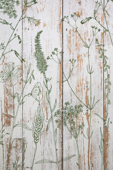 I.O.D. Sprigs Stamp featuring green botanical designs on a whitewashed wood background.