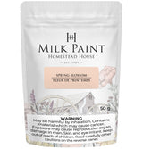 50g Homestead House Spring Blossom Milk Paint bag with health warnings and a floral wagon wheel graphic.