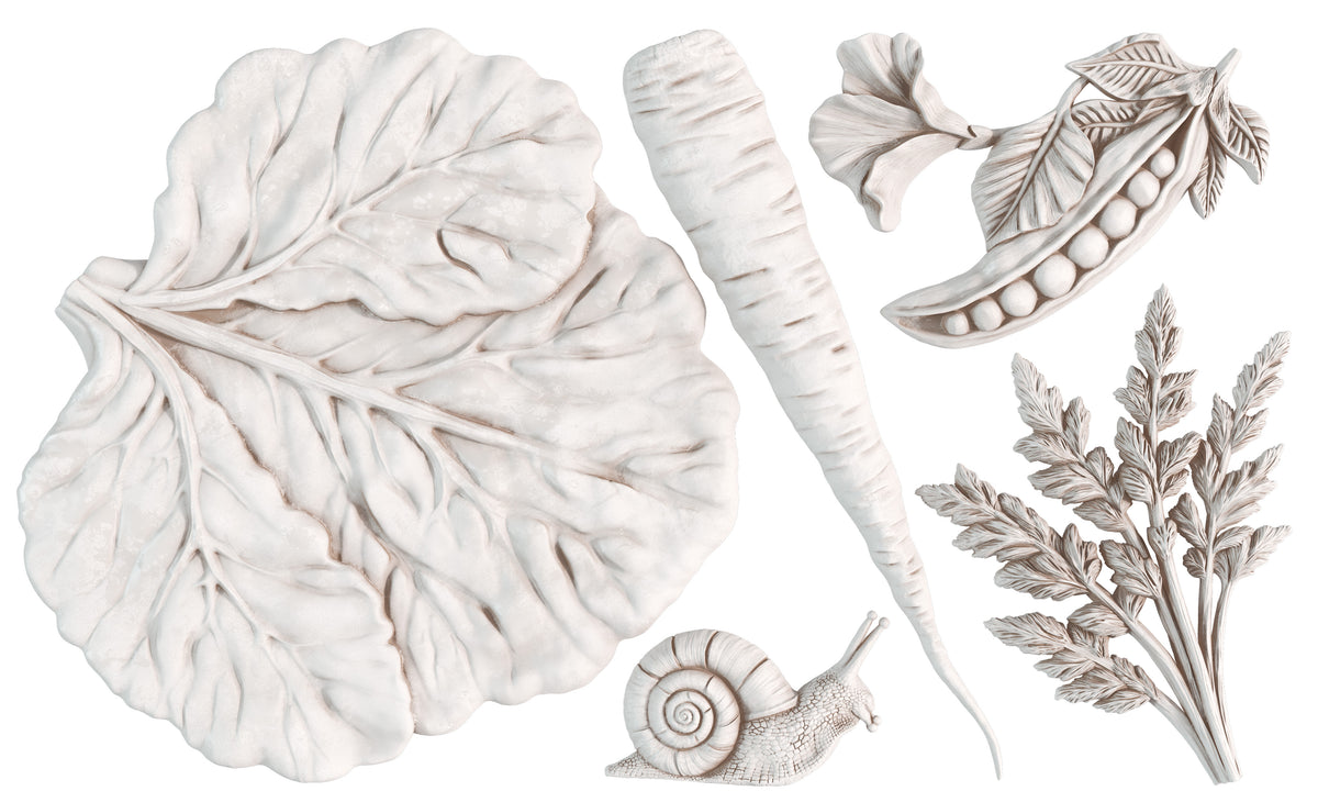 Large leaf, carrot, parsley, and snail in pale tones for I.O.D. Spring Garden Mould by Iron Orchid Designs.