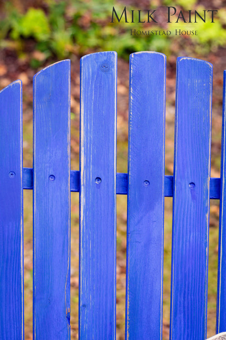 St-Laurent Blue Milk Paint fence slats by Homestead House with brand text in the corner.