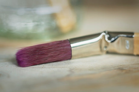 Staalmeester ProHybrid Series Brush Set of 3 with purple bristles arranged on a wooden surface.