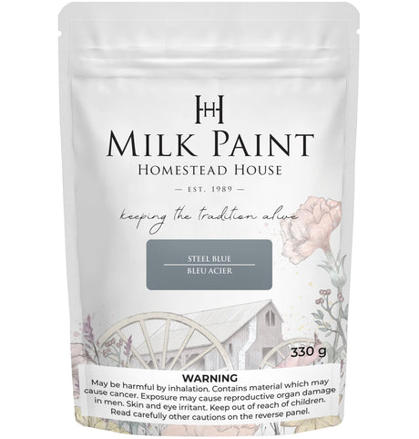 330g Steel Blue Milk Paint by Homestead House, floral and wagon wheel designs on packaging.