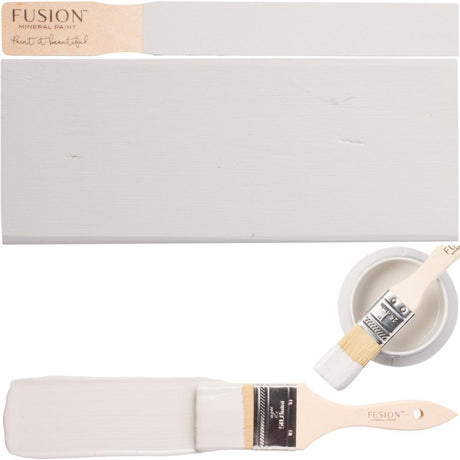 Paintbrush, wood sample, and open Sterling Fusion Mineral Paint container in matte finish.