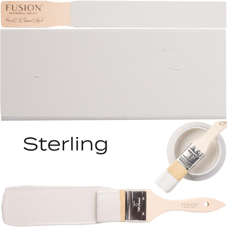 Paintbrush with Sterling Fusion Mineral Paint, painted board, and Fusion Mineral Paint can displayed together.