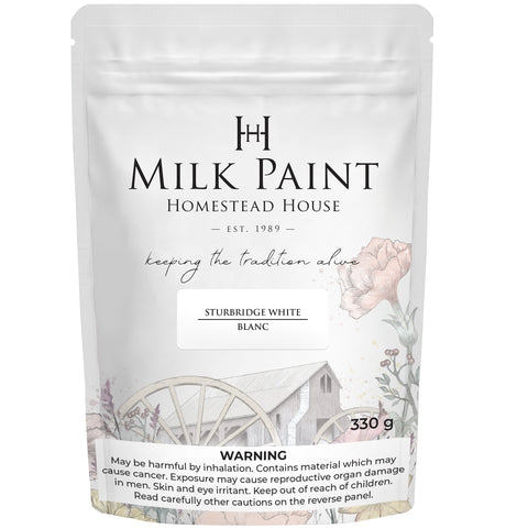 330g Sturbridge White Milk Paint by Homestead House, bag showing barn graphic and warning label.