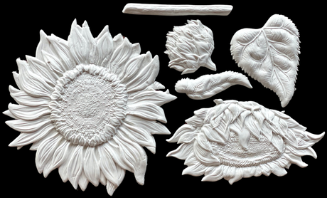 White clay sunflowers made with I.O.D. Sunflowers Mould; includes bloom, bud, stem, and leaves.