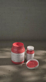 Two jars of Fusion Mineral Paint Sunset Alchemy; one jar is open.