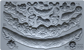 I.O.D. Swags Mould by Iron Orchid Designs, featuring ornate floral and ribbon shapes, labeled in ml and g.