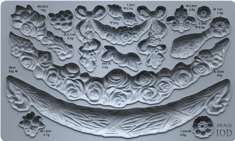 I.O.D. Swags Mould by Iron Orchid Designs, featuring ornate floral and ribbon shapes, labeled in ml and g.