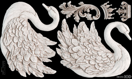 Ornate swans, leaves, and crowns crafted with the Swans Mould by IOD – Iron Orchid Designs on black.