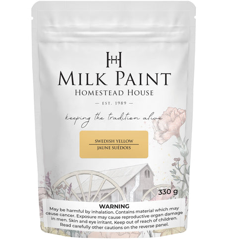 Homestead House Swedish Yellow Milk Paint, 330g bag, with rustic barn and floral-themed packaging.