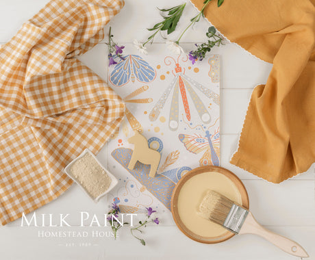 Swedish Yellow Milk Paint by Homestead House with brush, fabric, powder packet, herbs, and instruction card.