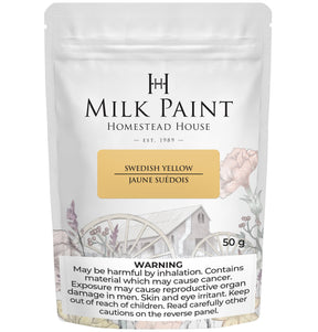 Homestead House Swedish Yellow Milk Paint, 50g bag, with floral and wagon wheel artwork on the label.