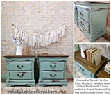Pair of green Sweetie Jane nightstands by Old Fashioned Milk Paint, dark tops, vintage handles, and bunting.