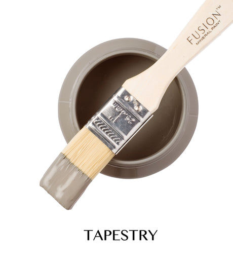 Paintbrush with gray Tapestry Fusion Mineral Paint on open Fusion Mineral Paint can.