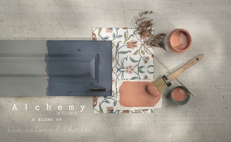 An Alchemy by Fusion Digital Download and Fusion Mineral Paint jar displayed on a stone surface.