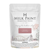 330g Texas Rose Milk Paint by Homestead House, bag features floral wagon art and visible safety warning label.