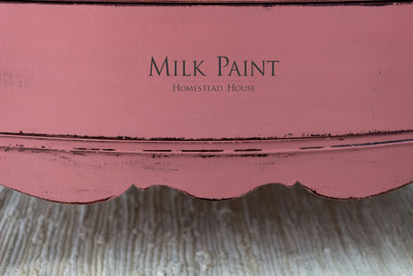 Wood painted in Texas Rose Milk Paint by Homestead House, featuring “Milk Paint Homestead House” text.