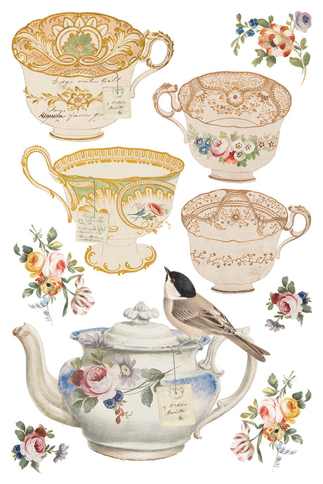 The Belgravia Transfer by I.O.D. with vintage teacups and a bird-accented teapot on a plain white background.