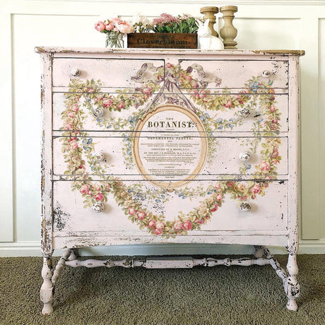 Vintage pink dresser featuring floral I.O.D. The Botanist Transfer (retired); rustic botanical decorative style.