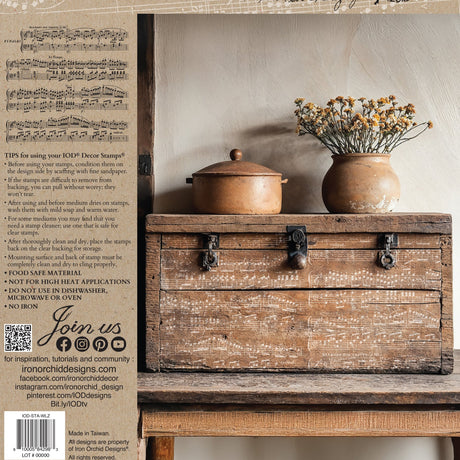 The Waltz Stamp by IOD displayed next to vintage sheet music and dried flowers.